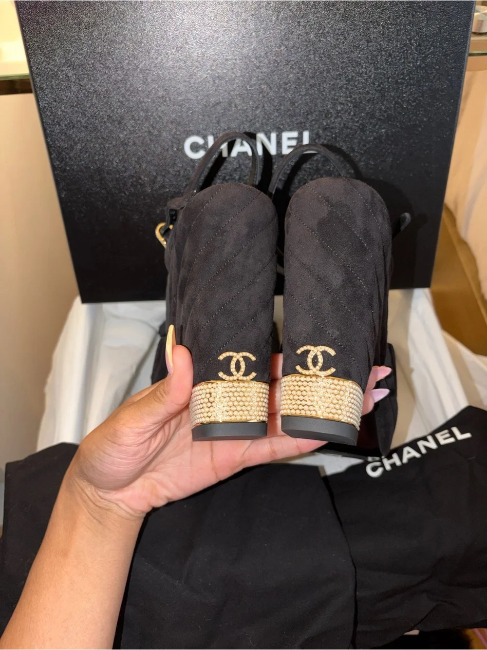 CHANEL Black Suede Platform Sandals with Bow and Pearl Heel Accent